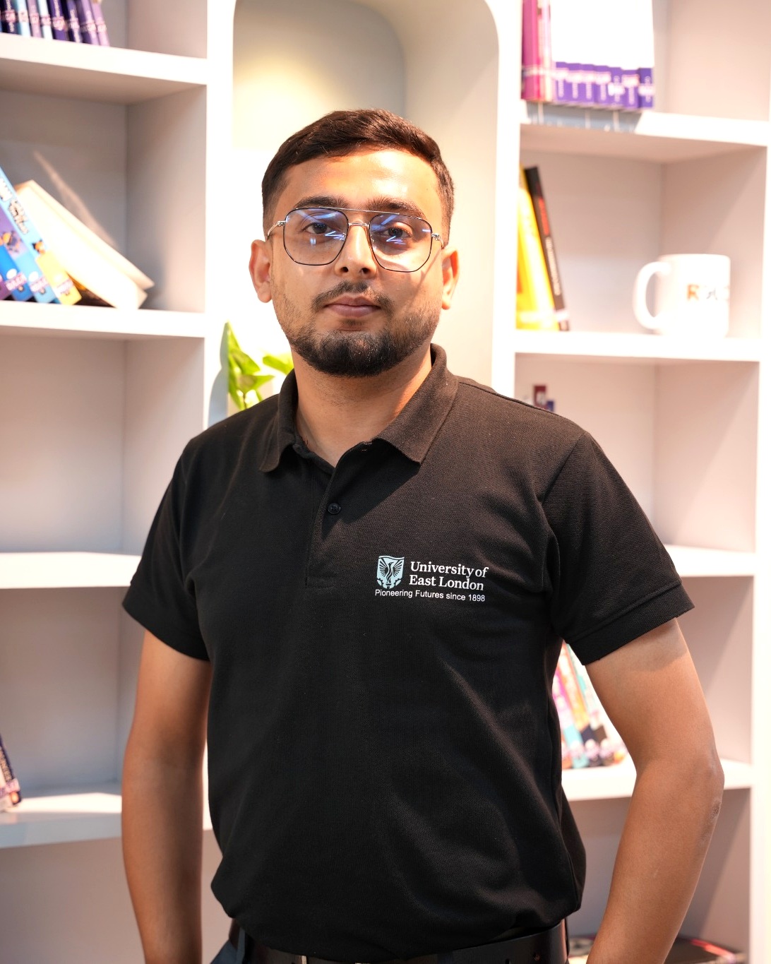 Professional portrait of Amrit Sharma